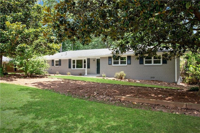 ranch-style home with a front yard