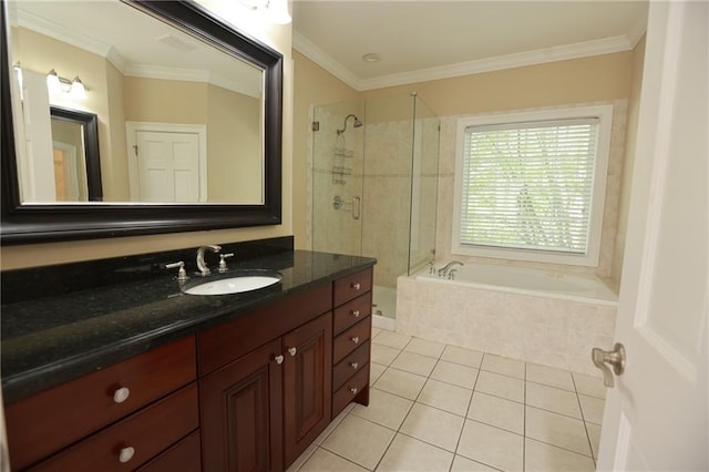 3541 Roswell Rd NE Unit 20, Atlanta, GA 30305 - full bath with tile patterned flooring, vanity, a garden tub, a shower stall, and ornamental molding