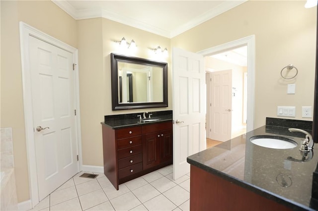 3541 Roswell Rd NE Unit 20, Atlanta, GA 30305 - bathroom with two vanities, ornamental molding, tile patterned flooring, and baseboards
