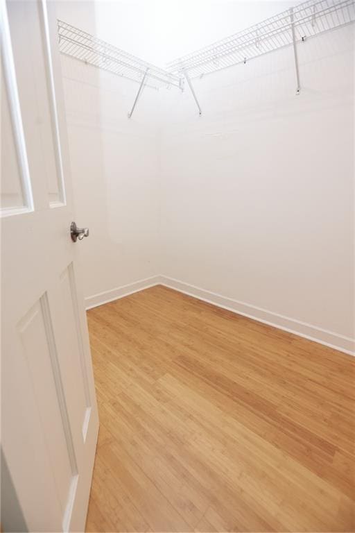 3541 Roswell Rd NE Unit 20, Atlanta, GA 30305 - walk in closet featuring light wood-type flooring