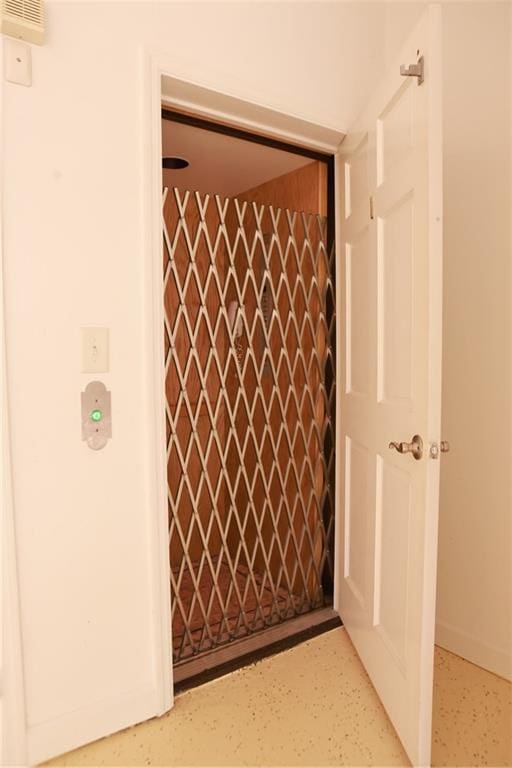 3541 Roswell Rd NE Unit 20, Atlanta, GA 30305 - elevator with baseboards