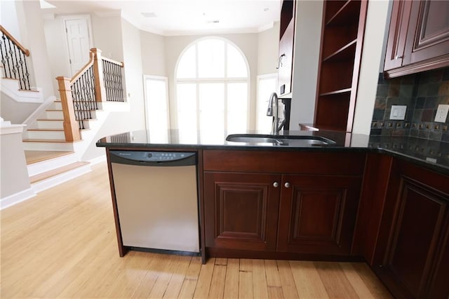 3541 Roswell Rd NE Unit 20, Atlanta, GA 30305 - kitchen featuring stainless steel dishwasher, a sink, open shelves, light wood-type flooring, and crown molding