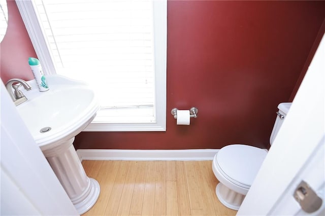 3541 Roswell Rd NE Unit 20, Atlanta, GA 30305 - bathroom with toilet, wood finished floors, and baseboards