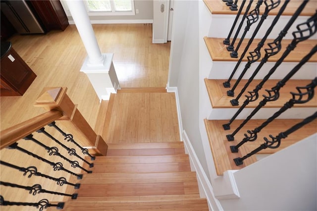 3541 Roswell Rd NE Unit 20, Atlanta, GA 30305 - stairs with wood finished floors and baseboards