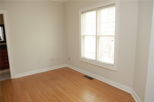 3541 Roswell Rd NE Unit 20, Atlanta, GA 30305 - spare room featuring light wood finished floors and baseboards