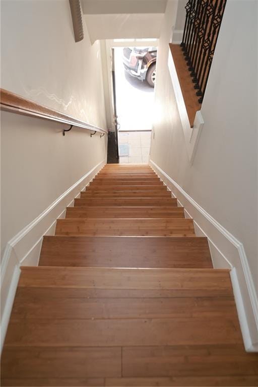3541 Roswell Rd NE Unit 20, Atlanta, GA 30305 - stairs featuring wood finished floors