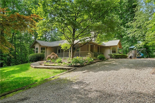 1920 Jett Ridge Rd, Cumming, GA 30041 - single story home with a porch, gravel driveway, and a front yard