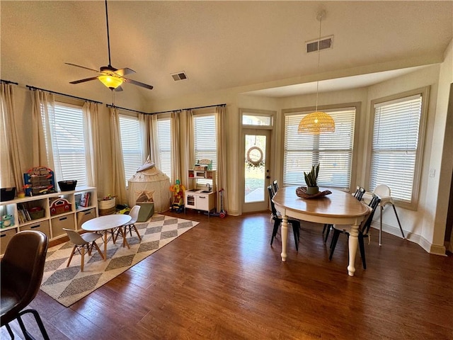 dining room featuring visible vents, baseboards, dark wood-type flooring, and ceiling fan