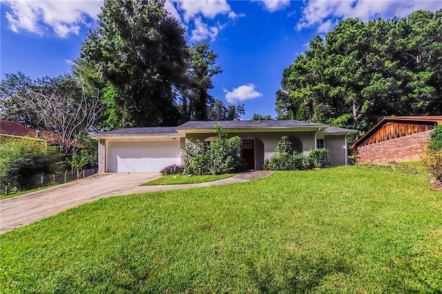 single story home featuring a garage and a front lawn