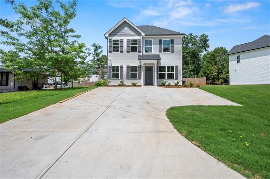 view of front of home with a front lawn