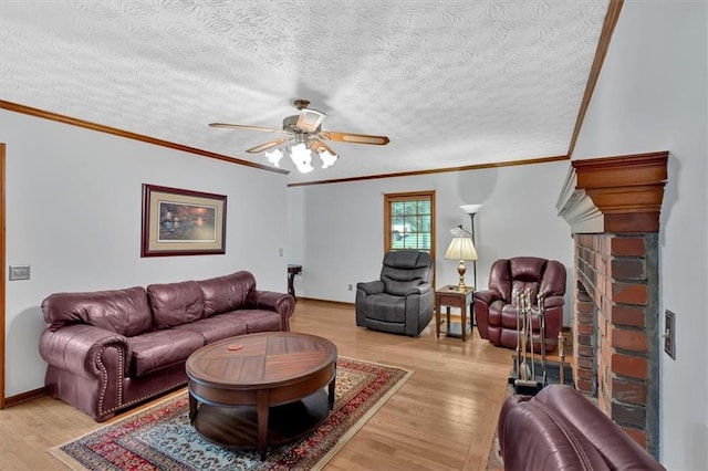 40 Picketts Forge Dr W, Acworth, GA 30101 - living area featuring light wood-type flooring, ceiling fan, crown molding, a textured ceiling, and baseboards