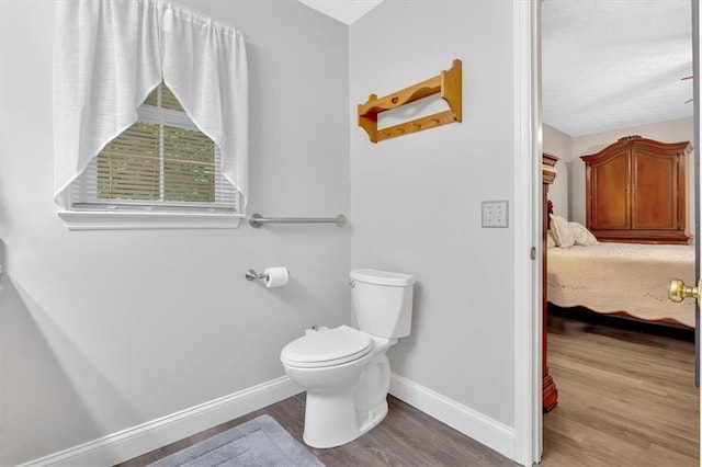 40 Picketts Forge Dr W, Acworth, GA 30101 - ensuite bathroom with wood finished floors, baseboards, and toilet