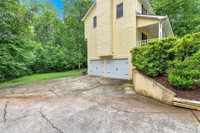 40 Picketts Forge Dr W, Acworth, GA 30101 - view of property exterior featuring a garage and concrete driveway