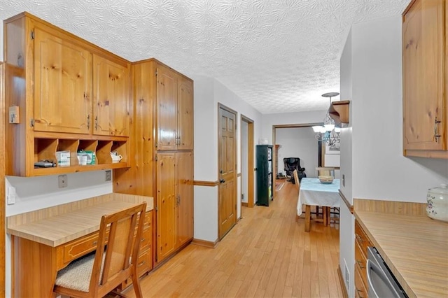 40 Picketts Forge Dr W, Acworth, GA 30101 - kitchen featuring light wood-style floors, dishwasher, open shelves, a chandelier, and brown cabinetry
