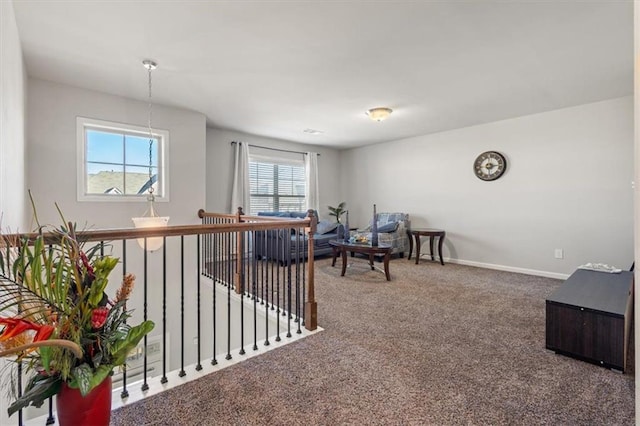 interior space with plenty of natural light and carpet floors