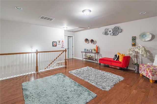 living area with dark hardwood / wood-style flooring