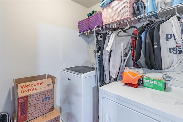 laundry area with washer and clothes dryer