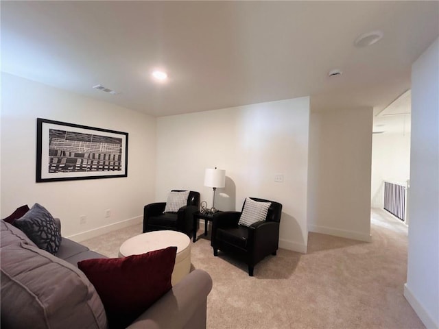 living room featuring light colored carpet