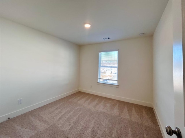 empty room featuring carpet floors