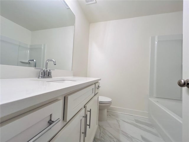 bathroom with vanity and toilet