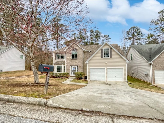 view of property featuring a garage