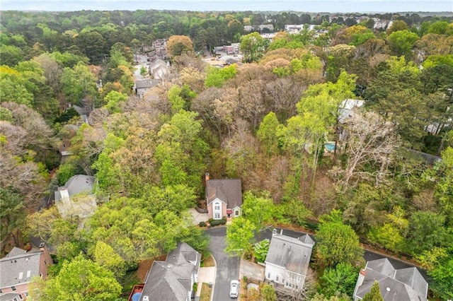 aerial view with a wooded view