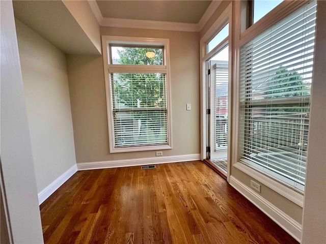 4875 Carre Way, Alpharetta, GA 30022 - doorway to outside featuring baseboards, ornamental molding, and wood finished floors
