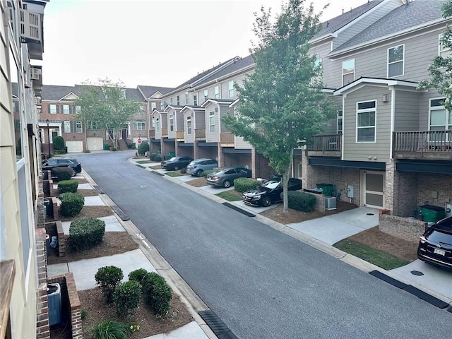 4875 Carre Way, Alpharetta, GA 30022 - view of asphalt street with a residential view and curbs