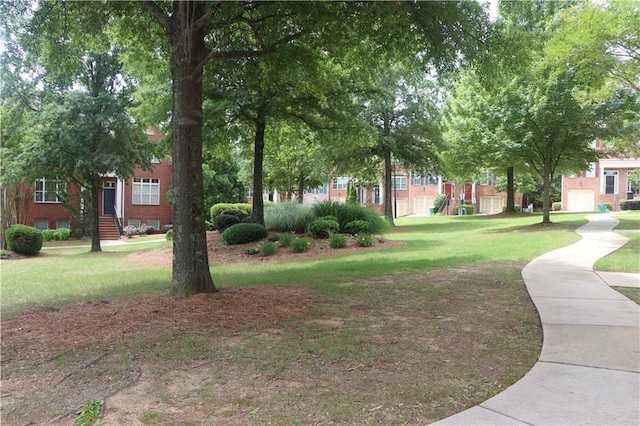 4875 Carre Way, Alpharetta, GA 30022 - surrounding community with a lawn
