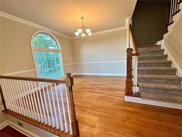 4875 Carre Way, Alpharetta, GA 30022 - stairs with wood finished floors, a chandelier, baseboards, and crown molding