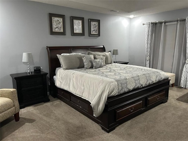bedroom with light carpet