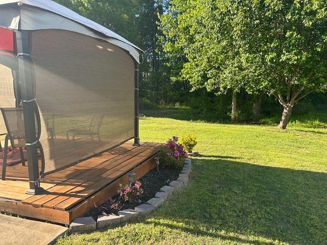 view of yard featuring a deck