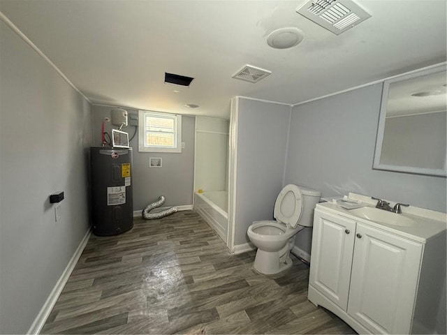 full bathroom featuring water heater, toilet, hardwood / wood-style floors, shower / bathing tub combination, and vanity