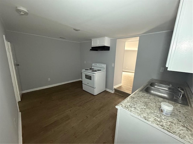 kitchen with white cabinets, dark hardwood / wood-style flooring, white range with electric cooktop, sink, and light stone counters