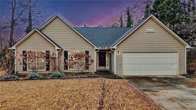 ranch-style house with a garage