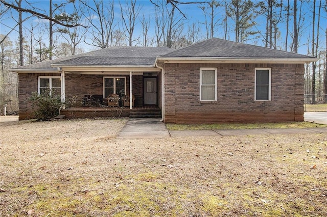 ranch-style house featuring covered porch