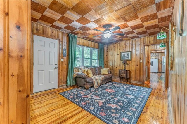 103 White Cir, Rockmart, GA 30153 - living area featuring wooden walls, wooden ceiling, a ceiling fan, and wood-type flooring