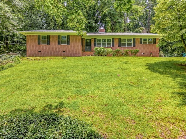 103 White Cir, Rockmart, GA 30153 - ranch-style house featuring a front lawn, crawl space, a chimney, brick siding, and view of wooded area
