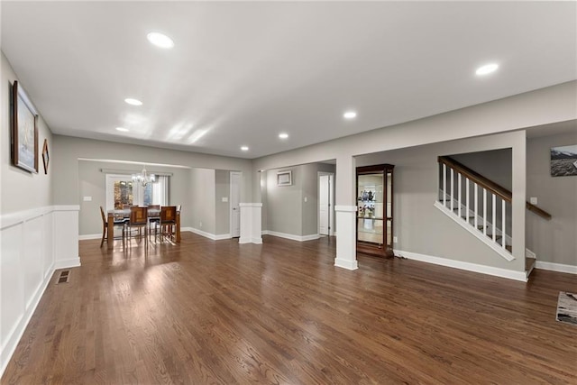 4635 Dawsonville Hwy, Gainesville, GA 30506 - living room featuring stairway, wood finished floors, visible vents, recessed lighting, and a chandelier