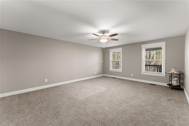 4635 Dawsonville Hwy, Gainesville, GA 30506 - carpeted empty room with visible vents, baseboards, and a ceiling fan