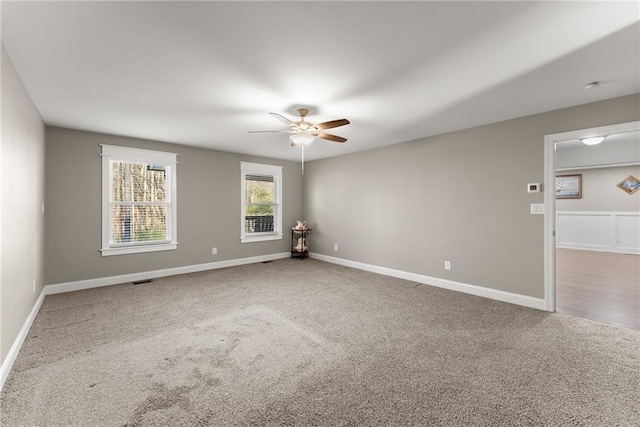 4635 Dawsonville Hwy, Gainesville, GA 30506 - unfurnished room with baseboards, carpet floors, and a ceiling fan