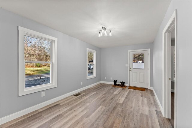 4635 Dawsonville Hwy, Gainesville, GA 30506 - interior space featuring visible vents, baseboards, and light wood-style floors