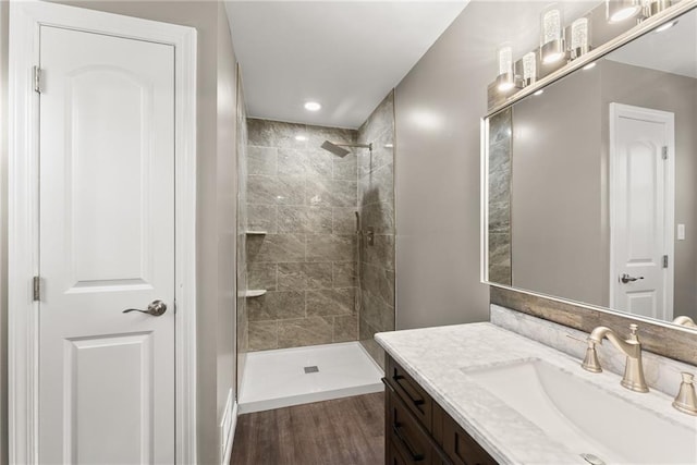 4635 Dawsonville Hwy, Gainesville, GA 30506 - bathroom with vanity, wood finished floors, and a tile shower