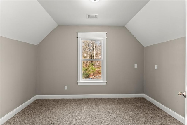 4635 Dawsonville Hwy, Gainesville, GA 30506 - additional living space featuring vaulted ceiling, visible vents, baseboards, and carpet floors