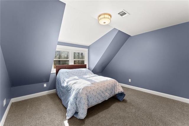 4635 Dawsonville Hwy, Gainesville, GA 30506 - carpeted bedroom featuring visible vents, lofted ceiling, and baseboards