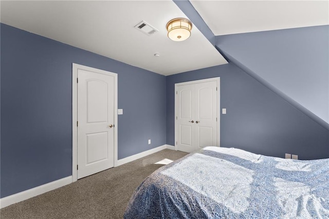 4635 Dawsonville Hwy, Gainesville, GA 30506 - bedroom with baseboards, visible vents, carpet floors, vaulted ceiling, and a closet