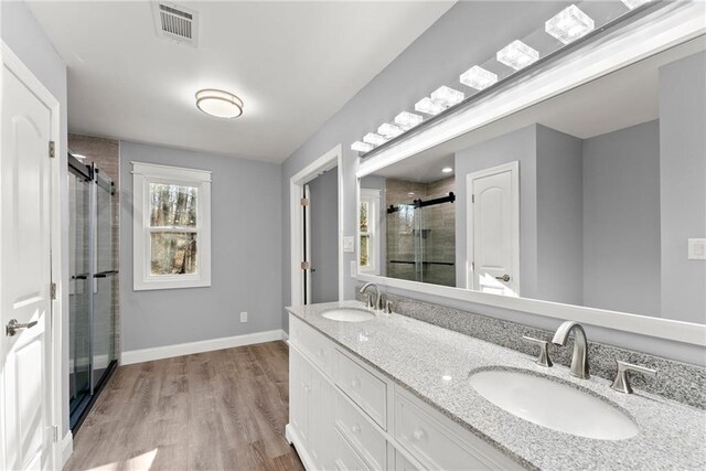 4635 Dawsonville Hwy, Gainesville, GA 30506 - bathroom with a shower stall, baseboards, visible vents, and a sink