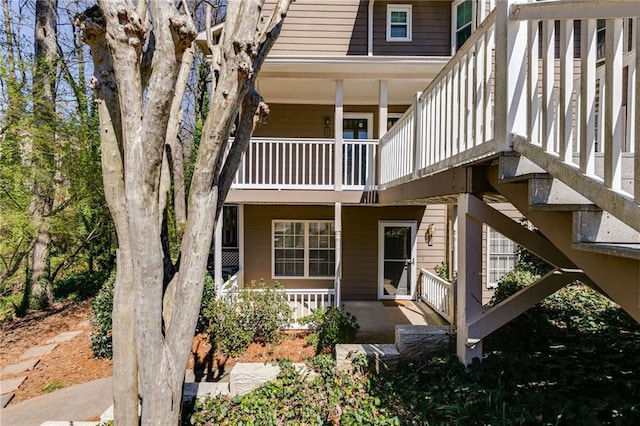 2135 N Forest Trl, Dunwoody, GA 30338 - back of house featuring a balcony and a porch