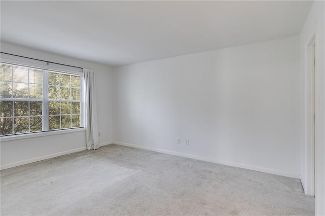 2135 N Forest Trl, Dunwoody, GA 30338 - carpeted empty room with baseboards
