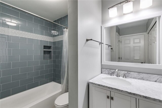 2135 N Forest Trl, Dunwoody, GA 30338 - bathroom with vanity, shower / bath combination with curtain, and toilet